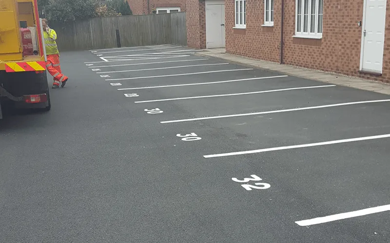 Freshly painted car park layout with designated parking bays