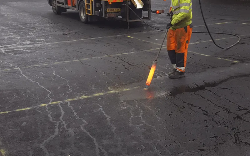 Road line removal using hydroblasting equipment